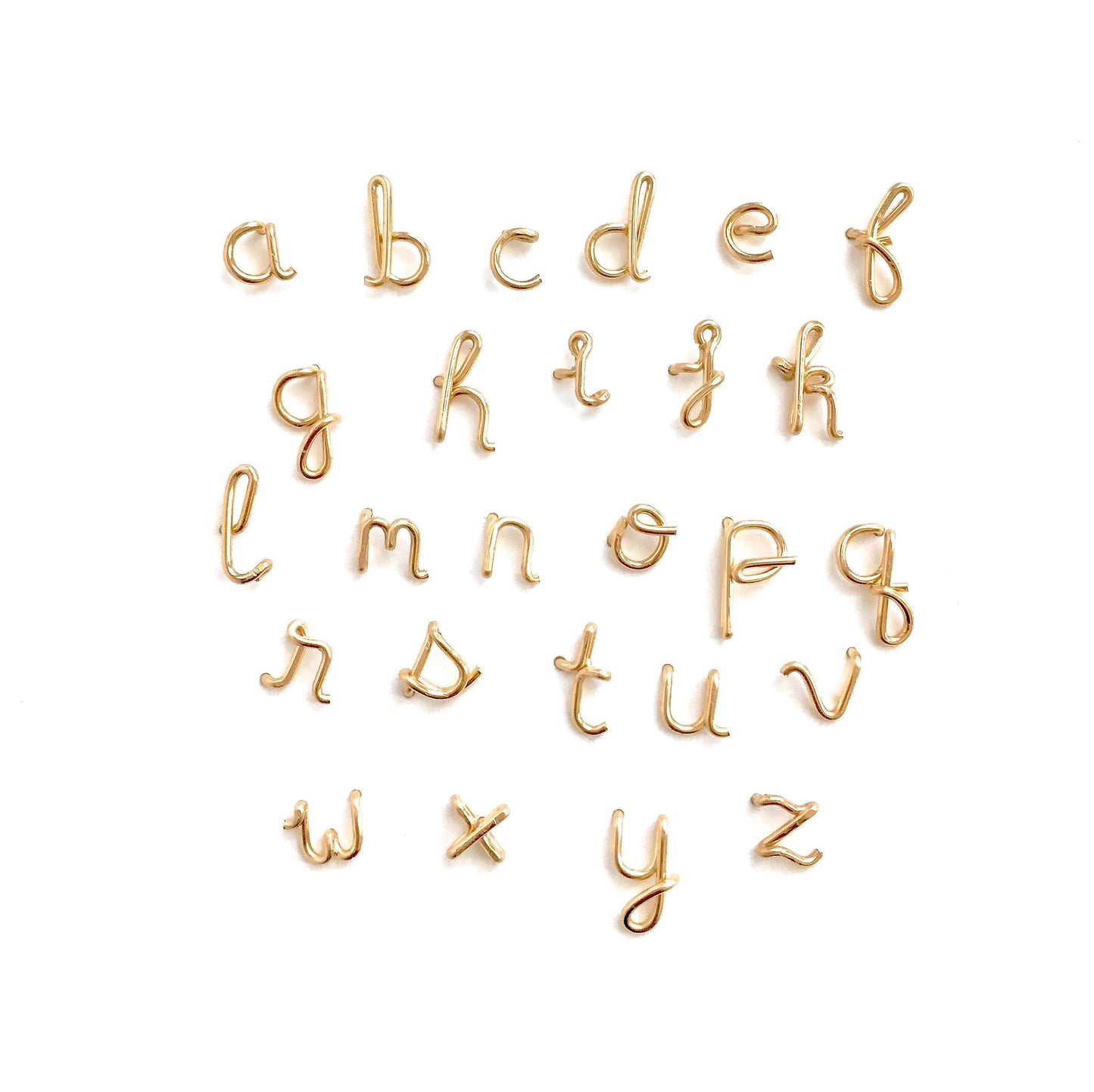 14k Gold Pair of Initial Earrings. Small Dainty lowercase script earrings. Gold Letter Wire Studs.