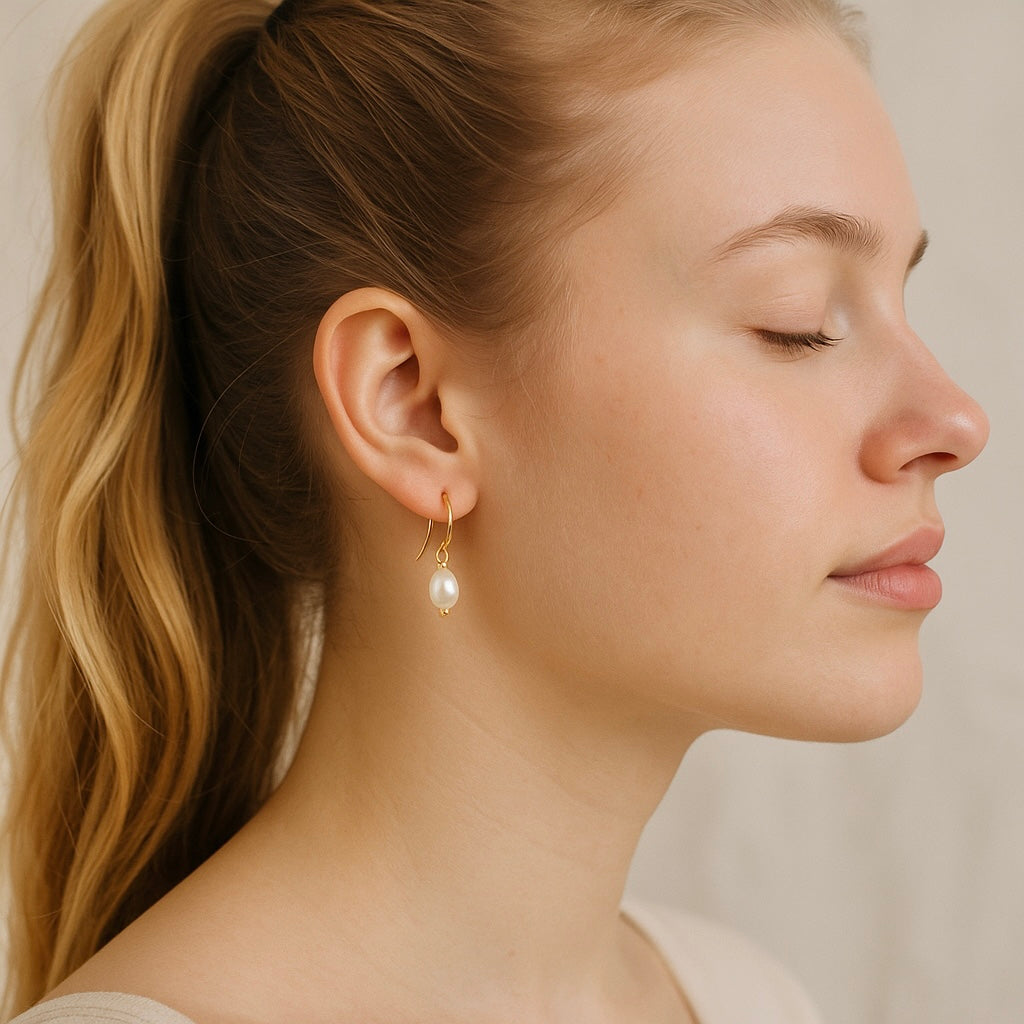 Freshwater Pearl Drop Earrings: Luxe Off White Oval Luminous Pearl Earrings